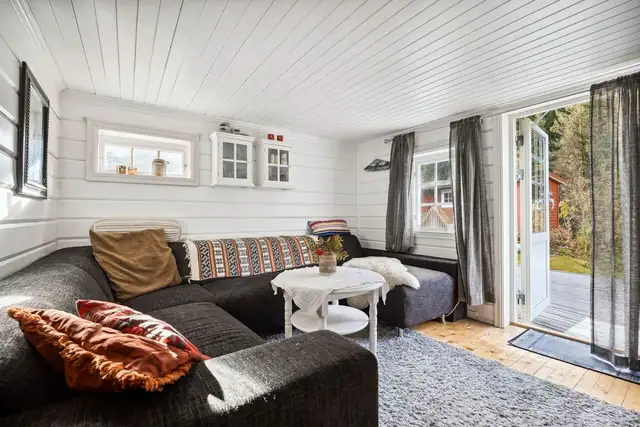 Her er det god plass til sofa med tilhørende møblement.