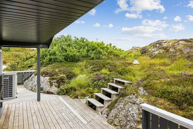 Overbygget terrasse gir en lun uteplass også når været skifter.