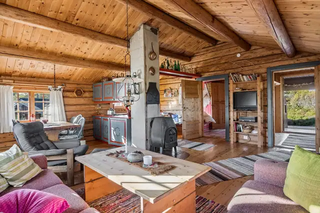 Vedovn bidrar til både varme og hyggelig hyttestemning